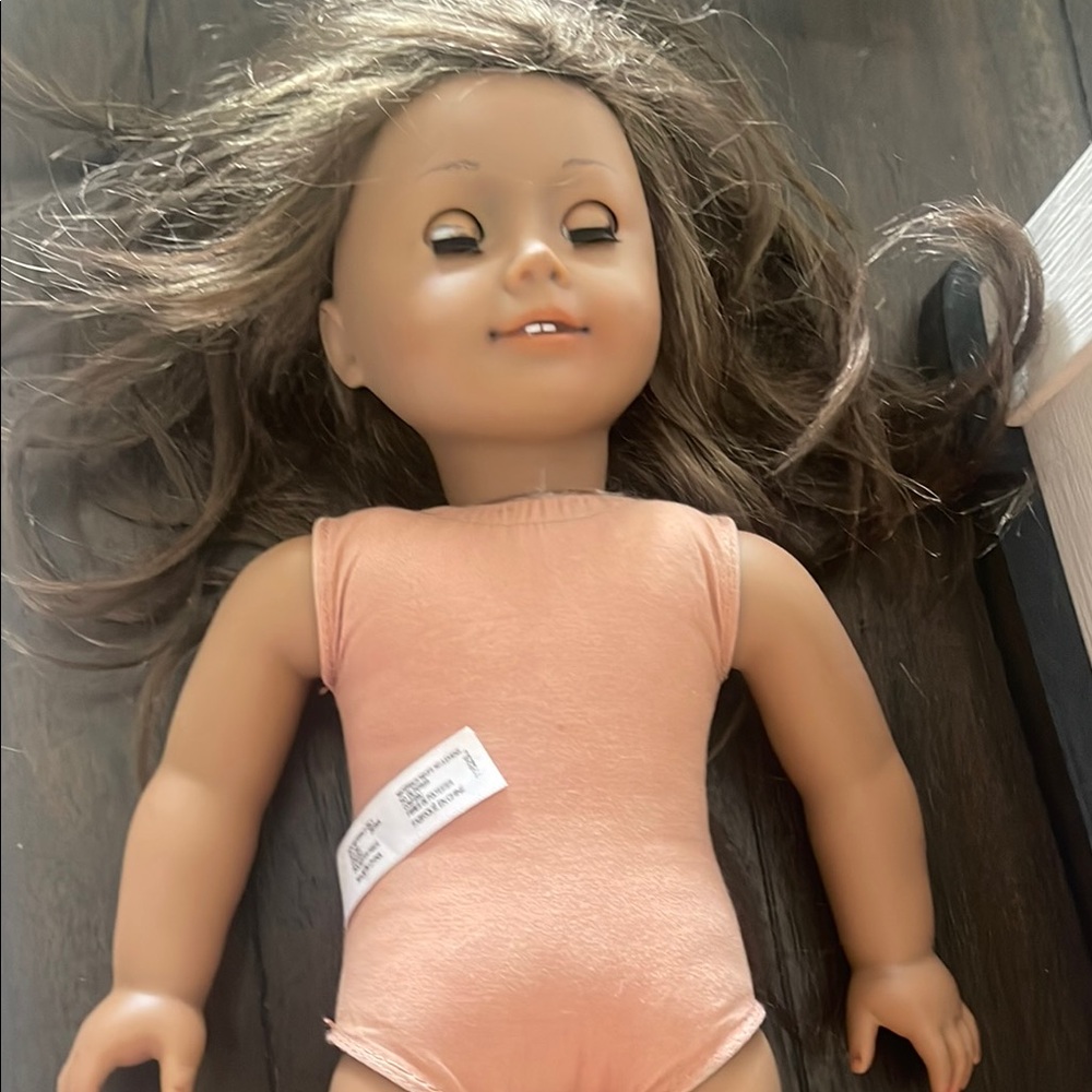 American Girl Doll with Peach Outfit